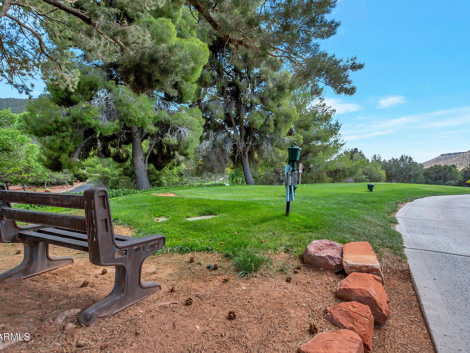 Landscaped green space and paths within the community