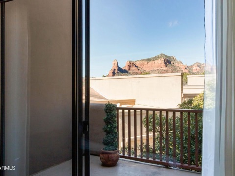 Red rocks beyond the balcony