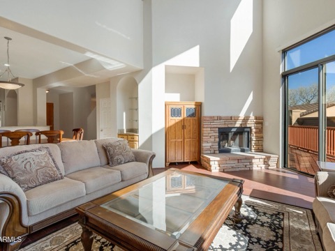 Sunlit great room with expansive windows
