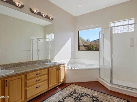 Bathroom with bathtub and shower